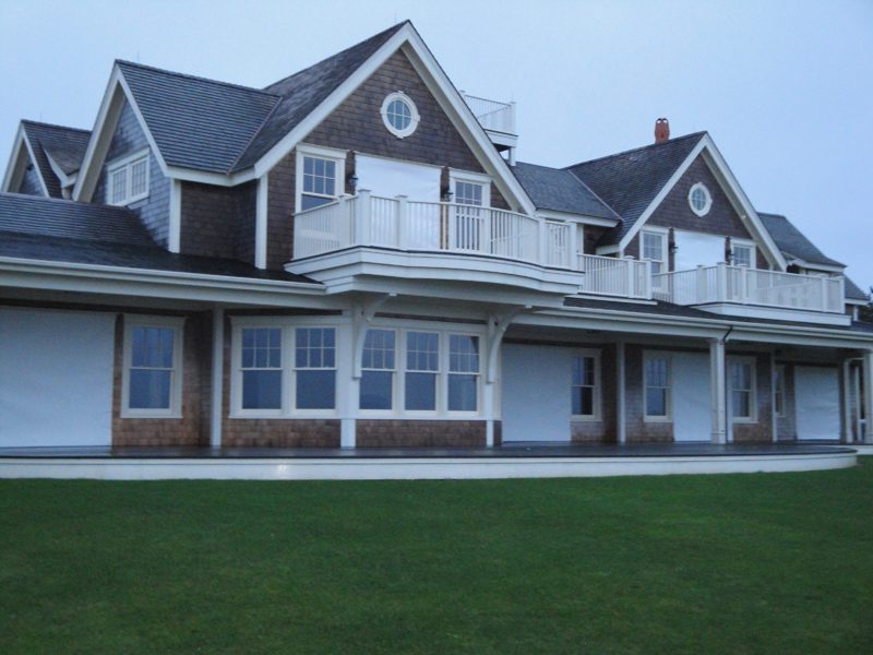 A large house with many windows and doors.